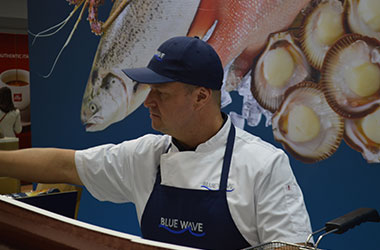 Raw seafood product display at Blue Wave Fine Food Sydney stand